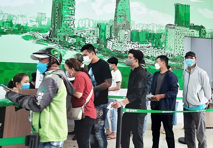 Lao động phi chính thức và bảo hiểm xã hội Lao động phi chính thức tham gia BHXH: tự nguyện hay bắt buộc?