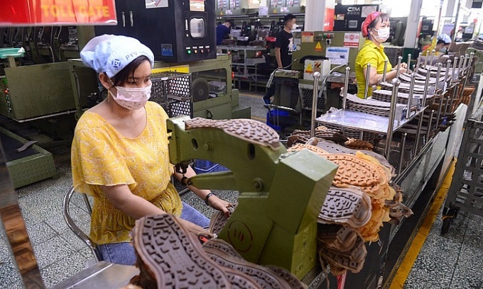 Công ty PouYuen Việt Nam hỗ trợ công nhân mất việc khoảng 275 tỉ đồng