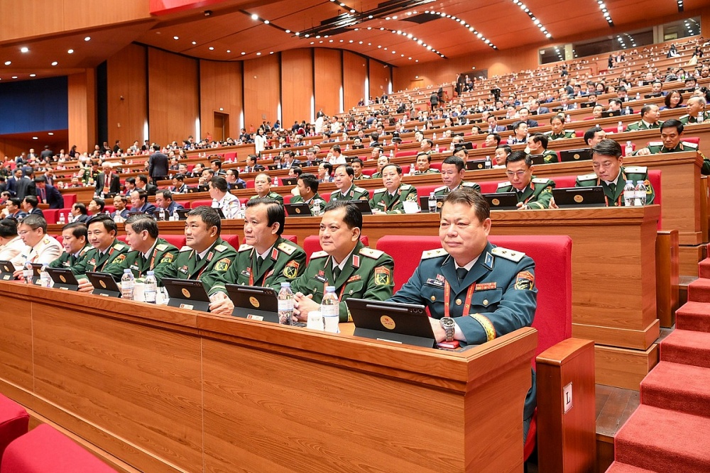 Các đại biểu dự phiên thảo luận tại hội trường về các Văn kiện Đại hội. Ảnh: Trung tâm Báo chí Đại hội XIV