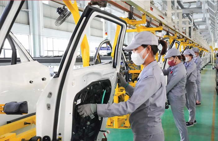 Công nhân làm việc tại xưởng lắp ráp, Công ty THACO Mazda. Ảnh: THACO Công nhân làm việc tại xưởng lắp ráp, Công ty THACO Mazda. Ảnh: THACO