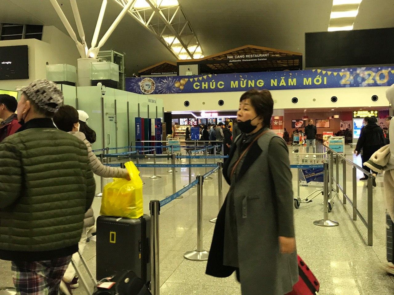 san bay quoc te noi bai luc rang sang va cau chuyen khau trang