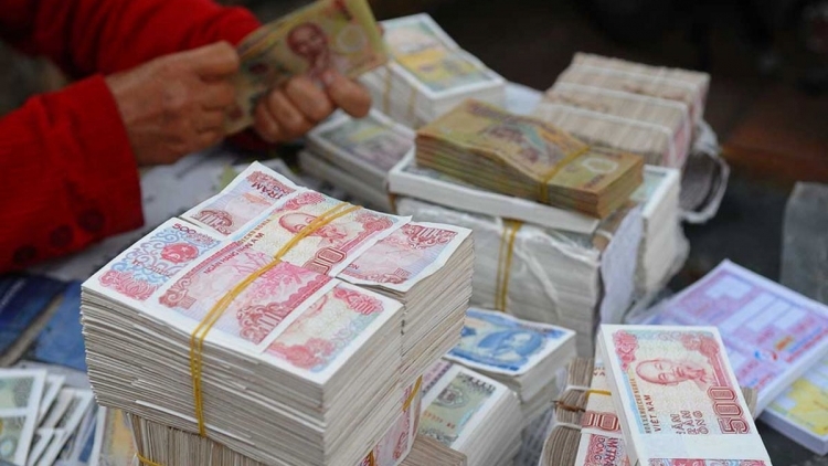 Tết Nguyên đán 2021, đổi tiền lẻ để kiếm lời có bị phạt không? Tết Nguyên đán 2021, đổi tiền lẻ để kiếm lời có bị phạt không?