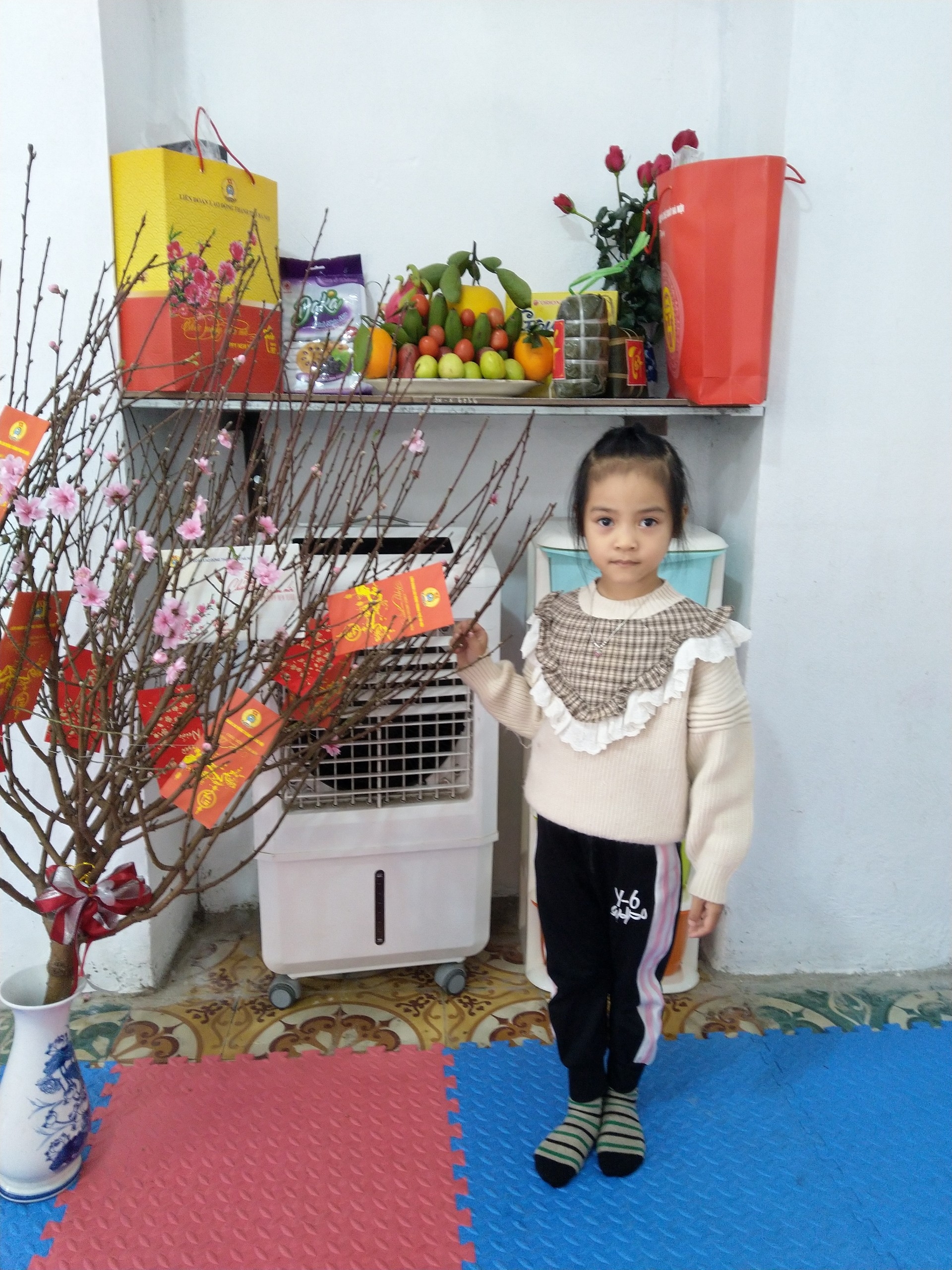 Những gia đình công nhân đón Tết ở xóm trọ Những gia đình công nhân đón Tết ở xóm trọ