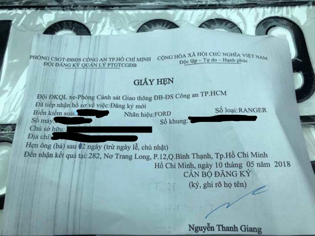 tu 018 ban xe ra ngoai tinh phai nop lai bien so va giay dang ky xe