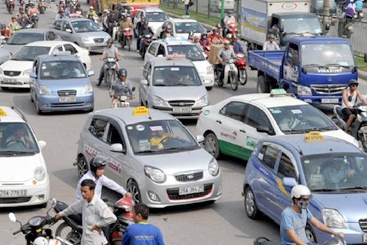 chu xe kinh doanh can mang giay to gi khi di doi sang bien so mau vang